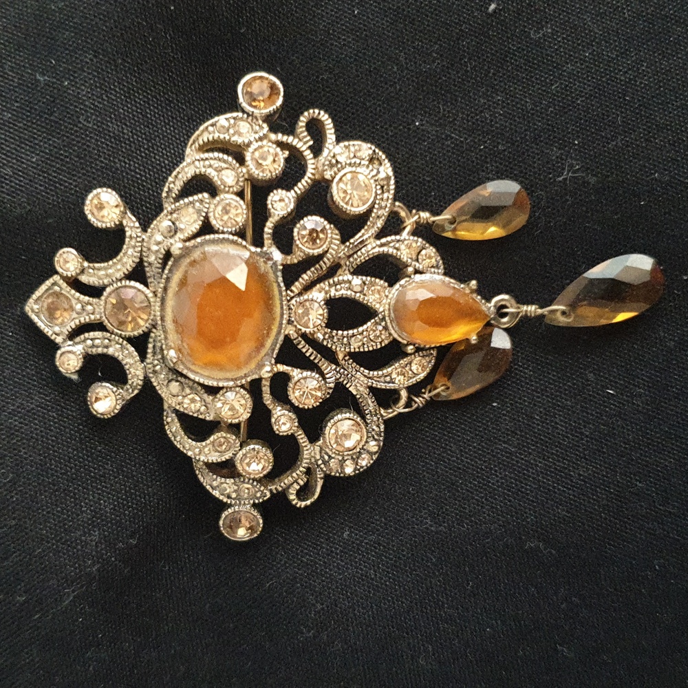 Monet gold color broach pin with amber crystals